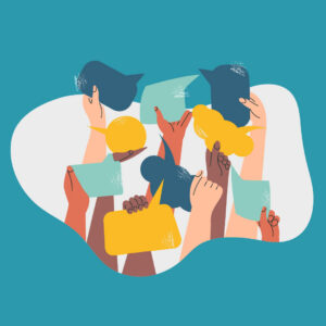 Image of several hands with diverse skin tones holding up speech bubbles to signify diverse communication
